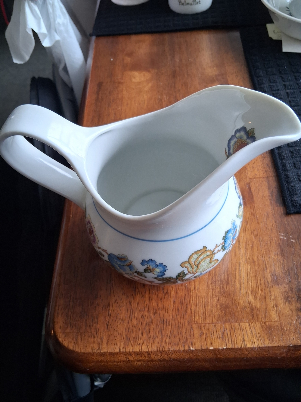 White Ceramic Floral Pitcher with Blue and Gold Accent